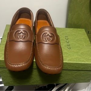 Brown Gucci loafers